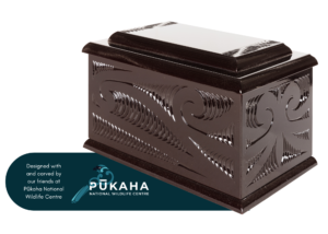 Māori carved urn with pukaha badge